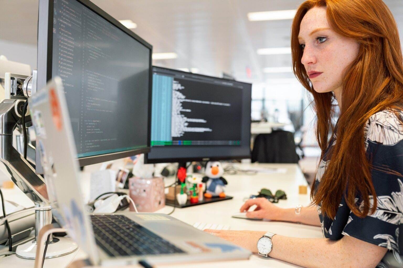 A Woman Diligently Following The Best 10-Point Seo Content Writing Checklist For [Current_Year] In An Office.